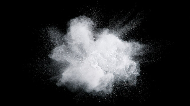 Dynamic white powder explosion snow on a black background. Flying dust particles and flour burst in freeze motion. Abstract cloud effect for design overlay