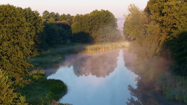 summer morning over the lake aerial shot	