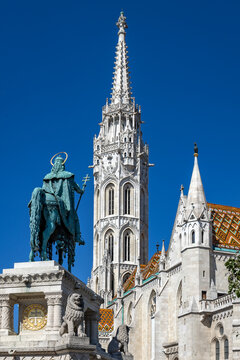 The historic Matthias Church and the Statue of St. Stephen located in Trinity Square within the Buda Castle District of Budapest, Hungary