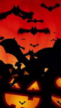 Animation of bats flying and pumpkins over fire