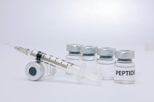 Glass bottle vial syringe medical peptide vaccine injection therapy container liquid health science cosmetic laboratory treatment gives hopeful