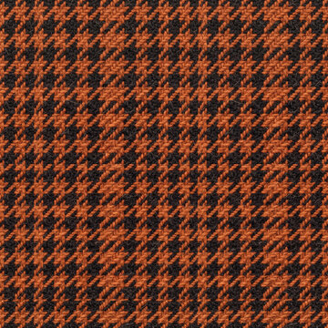 close-up houndstooth pattern in orange and black