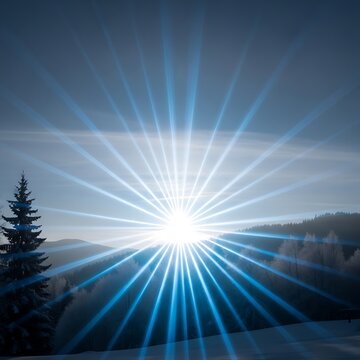 Bright sunburst with blue light rays over a snowy winter landscape