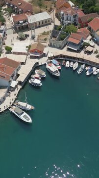 Vertical Aerial View of Fiskardo Village Port and Boats in Kefalonia Greece