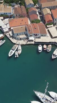 Vertical Aerial View of Fiskardo Village Port and Boats in Kefalonia Greece