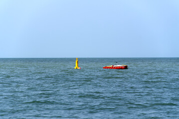 English Channel with yellow buoy and horizon at French city of Le Havre on a summer day. Photo taken July 14th, 2026, Le Havre, Normandie, France. © Michael Derrer Fuchs