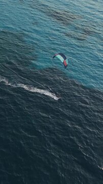 Vertical Aerial View of Kitesurfers Flying Kites over Agios Ioannis Beach in Lefkada Greece