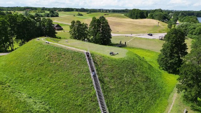 Prelomciskes hillfort mound on a shore of Dusia Lake, Meteliai Regional Park, Lithuania