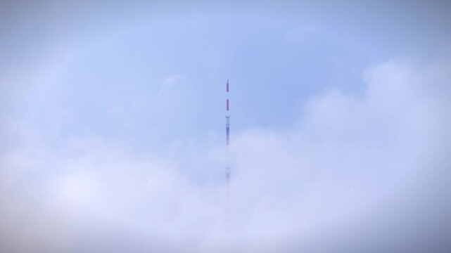 Uetliberg TV Tower Rising Above a Sea of Fog Near Zurich