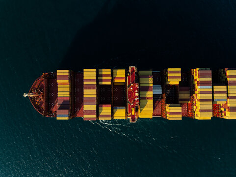 High Angle View Of A Large Container Ship Transporting Freight Across Open Ocean Waters Near Si Racha Chon Buri Thailand For Global Maritime Logistics