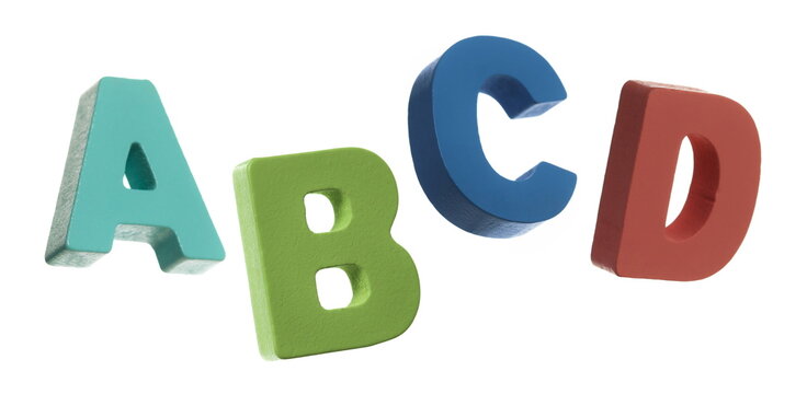 Wooden alphabet letters a, b, c, d flying, isolated on white background, clipping path