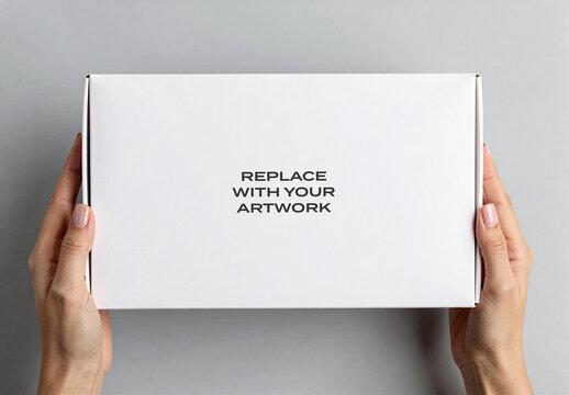 Rectangular box mockup held by hands, minimalist packaging presentation with placeholder text, clean studio background for branding and product display, template graphic design print