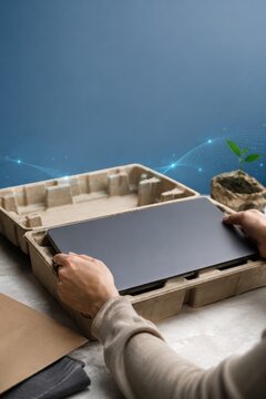 Unboxing Refurbished Laptop in Sustainable Packaging