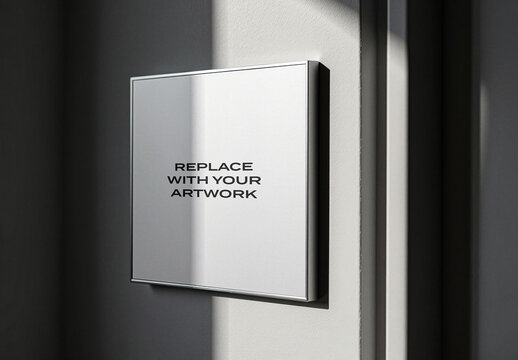 Square wall-mounted display panel mockup with placeholder text, mounted on a textured interior wall, realistic presentation for graphic design, branding, or artwork, clean modern aesthetic, Template