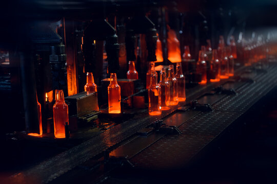 Automated Production of Glass Bottles in Manufacturing Plant
