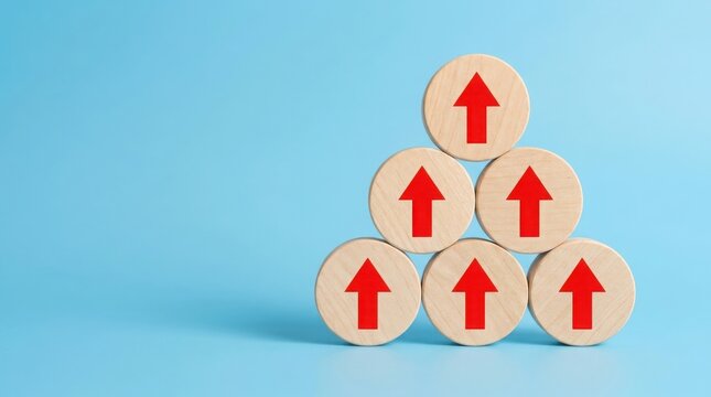 Wooden circles with red arrows pointing up on blue background