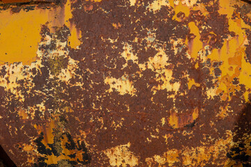 Corroding yellow metal texture showing industrial decay © Georges_Flayols