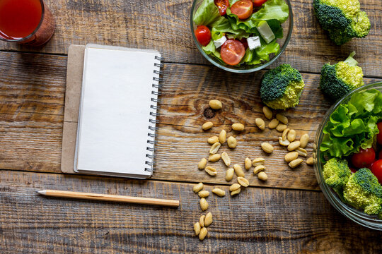 concept diet, slimming plan with vegetables top view mock up