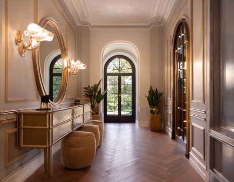 elegant hallway interior with mirrors lights and arched window design