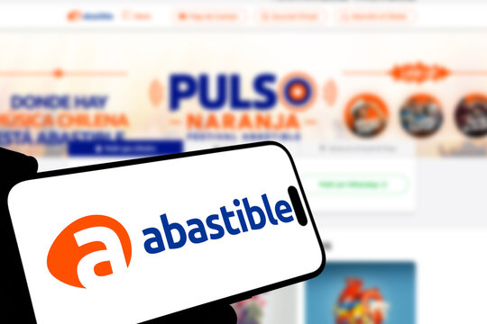 Kiel, Germany - 08-19-2026: Smartphone displaying Chilean liquefied petroleum gas company Abastible logo in front of companys webpage