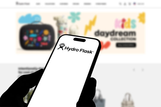 Kiel, Germany - 08-19-2026: Smartphone displaying US drinkware brand Hydro Flask logo in front of companys webpage