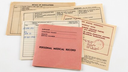 Naklejka premium Stack of vintage personal medical records and healthcare documents on white surface with documentation, document
