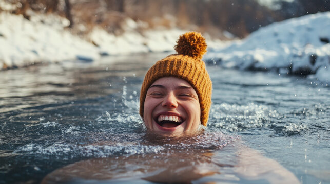 Woman enjoying winter swim in icy outdoor lake