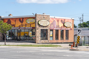 Fototapeta premium Toronto, ON, Canada - August 17, 2026: An Eggsmart restaurant in Toronto, ON, Canada. Eggsmart is a popular Canadian daytime dining chain specializing in breakfast, brunch, and lunch. 