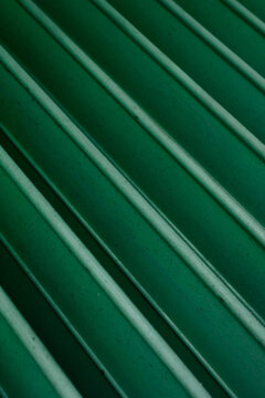Diagonal Green Corrugated Metal Lines Background