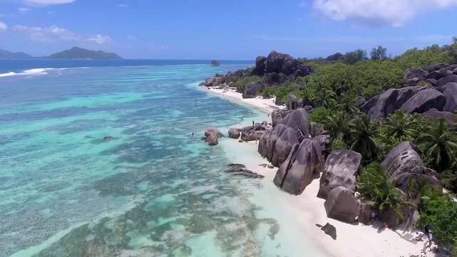 Anse Source D'Argent view on la digue island in Seychelles, aerial view in slow motion