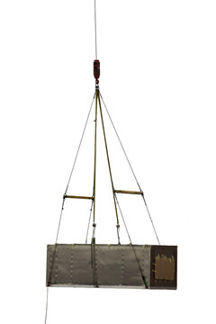 equipment rigged and lifted by a Crain Isolated on transparent background&nbsp;