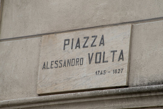 Piazza Alessandro Volta Street Sign Plate on a Wall in Como, Italy.