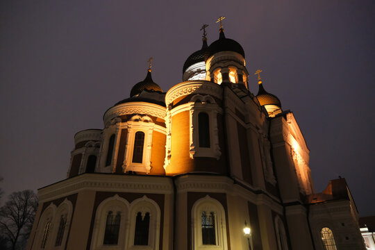 Low angle view of illuminated Alexander Nevsky Cathedral with onion domes at night in Tallinn, Estonia