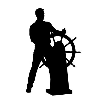 Silhouette of a captain steering a ship wheel