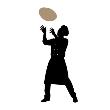 Silhouette of a professional chef tossing fresh pizza dough