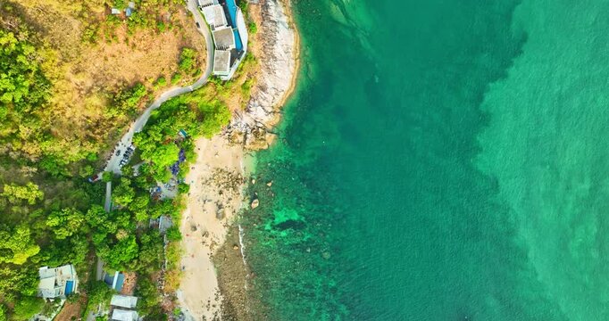 Scenic 4K aerial background of Ao Sane Beach with vibrant turquoise water, tropical coastline, lush greenery, and calm ocean atmosphere perfect for travel and tourism themes.
