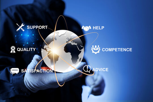 service concept with technician's hand holding globe represent international technical support and customer services by global company