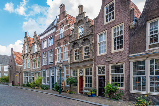 This historic street scene shows Hofstraat in Dordrecht, known for its characteristic stepped gables and monumental buildings
