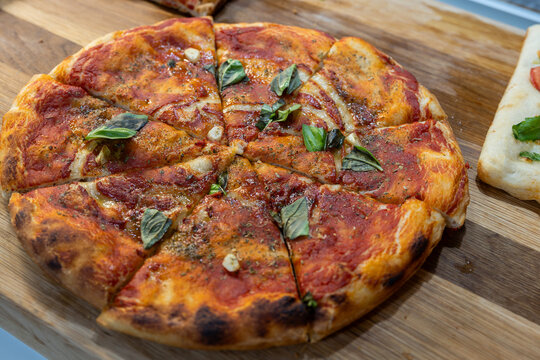 Garlic, oil, and oregano pizza, historically known as marinara pizza.