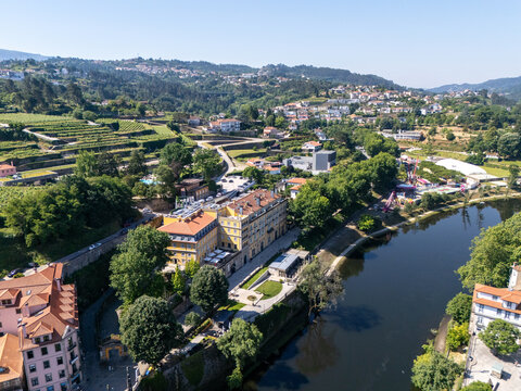 Aerial view of Casa da Calcada and Tamega River banks with vineyard terraces in Amarante