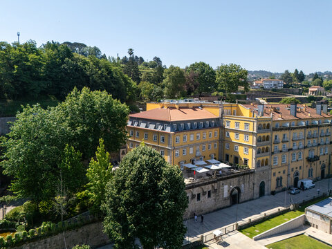 Aerial view of historic Casa da Calcada hotel facade and terrace in Amarante Portugal
