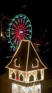 Capivari Village In Campos Do Jordao Sao Paulo Brazil. Breathtaking Aerial View Of Famous Ferris Wheel Of The City. Night Illuminated Skyline. Cities Of The World Landscape.