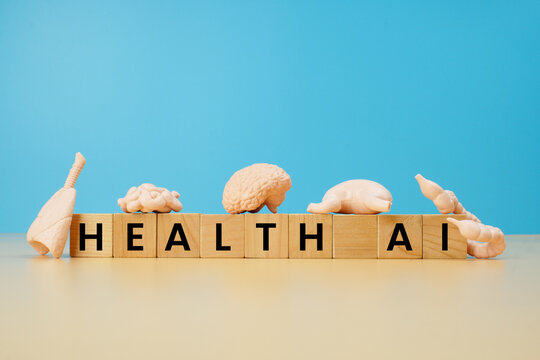 Health AI concept with wooden letter blocks, miniature brain and laboratory animal models, representing artificial intelligence, medical research, healthcare and biotechnology.