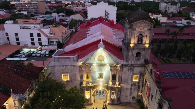 Drone shot of UNESCO San Augustin Church in Manila Philippines The scene provides Aerial view of Intramuros in Manila Philippines historic architecture and the urban landscape at dusk