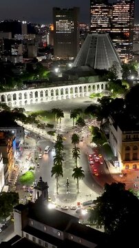 Lapa Bows In Rio De Janeiro Brazil. Aerial View Of A Bustling Downtown Cityscape With Modern Buildings. Night Downtown Cityscape. Illuminated Skyline. Rio de Janeiro Brazil.