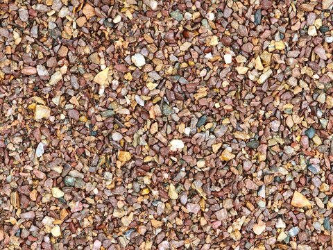 Brown and red decorative gravel stones texture background
