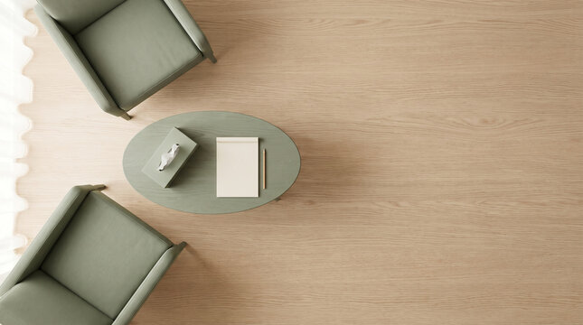 Top view of two chair near oval table with notebook and napkin on wood floor
