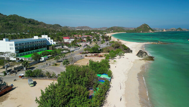 Drone perspective of Kuta Lombok coastline showing beach and clear ocean waters