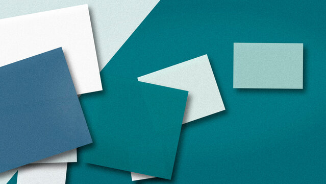 Colorful paper sheets are scattered across a teal surface, creating a tidy, creative mood suitable for office design, stationery branding, or DIY concept layouts.