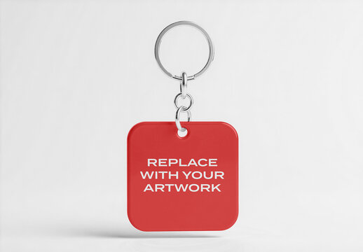 Square keychain mockup with silver metal ring and chain, isolated on white studio background, template for branding presentation, graphic design display, product print